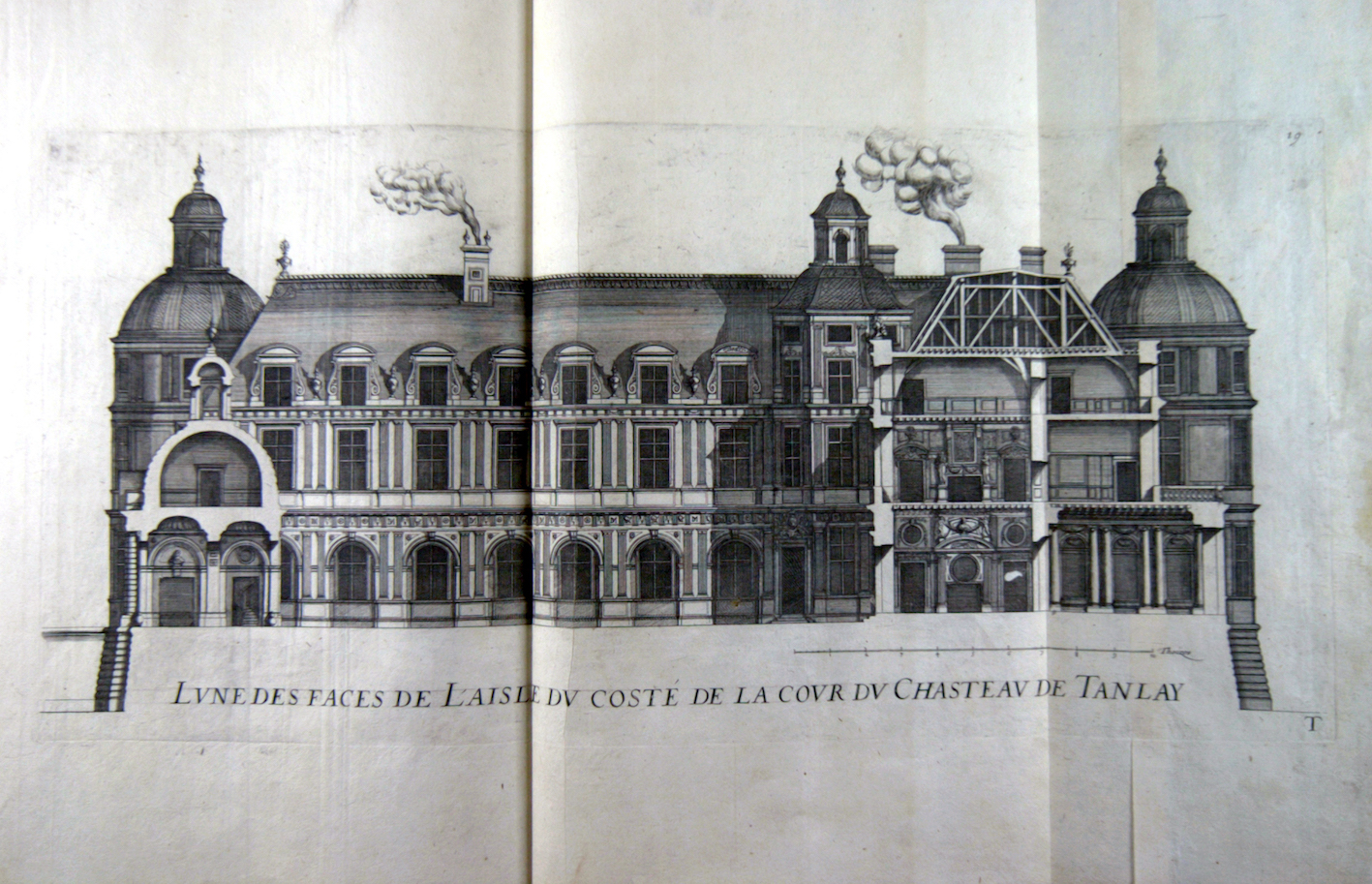 "Façade looking over the courtyard and a part of the wing of the château de Tanlay in Bourgogne."